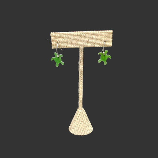 This is the front side of the earrings, the polished green jade sea turtles that dangle freely.