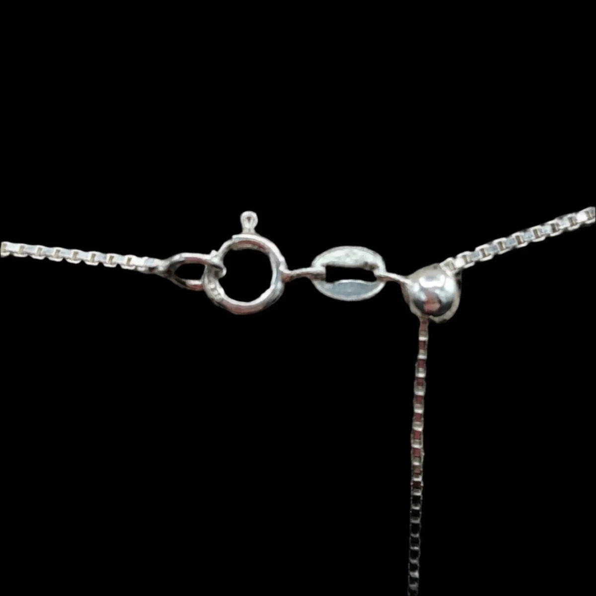 This is a close up of the clasp on this Sterling Silver chain.