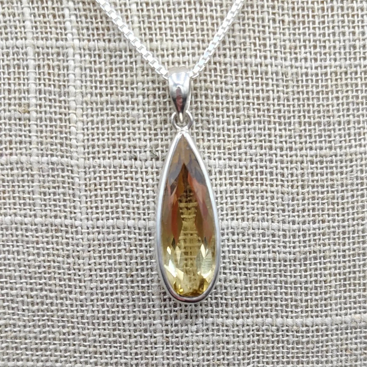 This is a close up of this lemon Quartz pendant