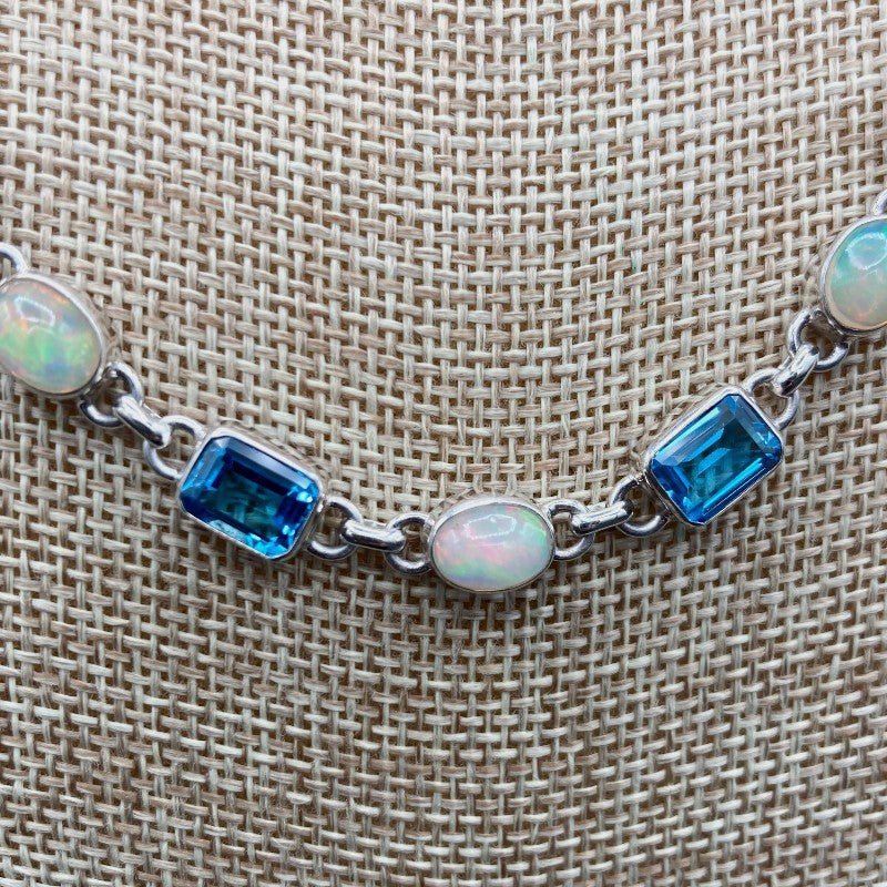 Close Up Of Blue Topaz And Opal Gemstones