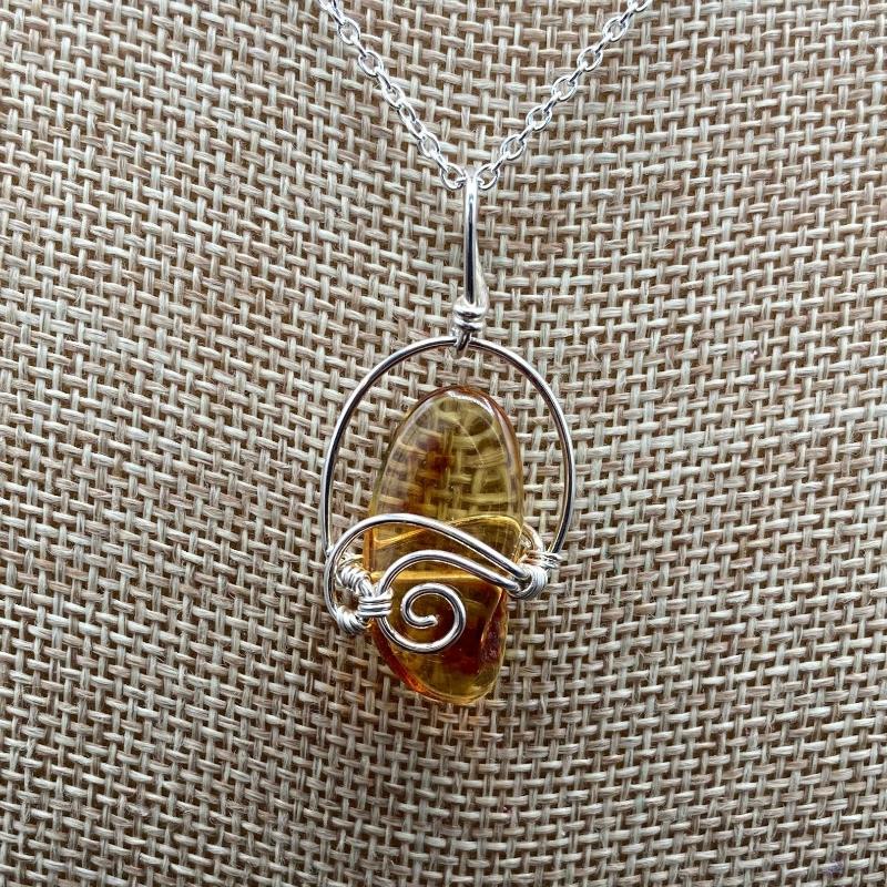 This Is A Close Up Of The Wire Wrapped Baltic Amber Pendant.