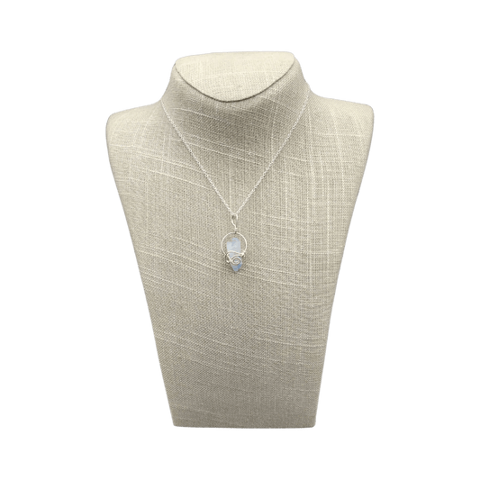 This is the front side of this Sterling Silver wire wrapped blue Dumotierite crystal necklace