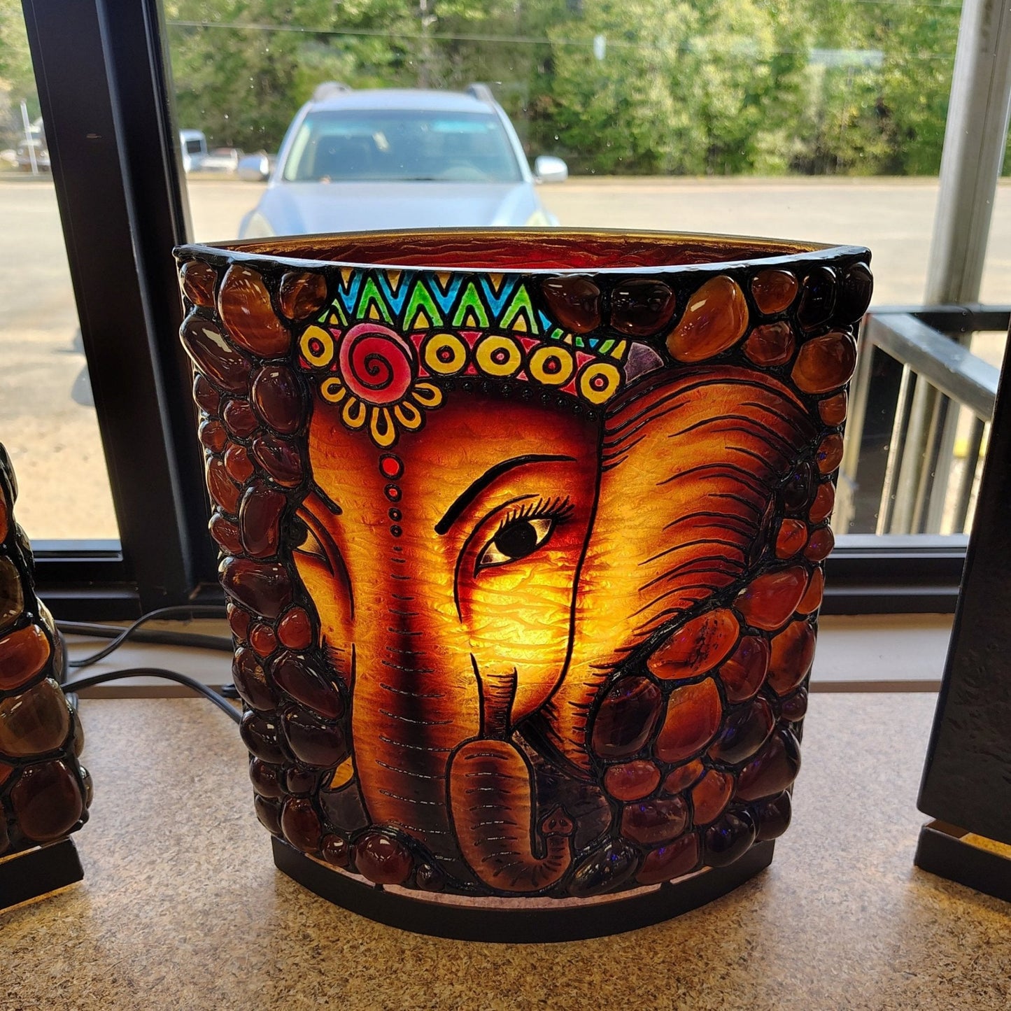 This is the front side of the Sumatra Amber Ganesha table lamp