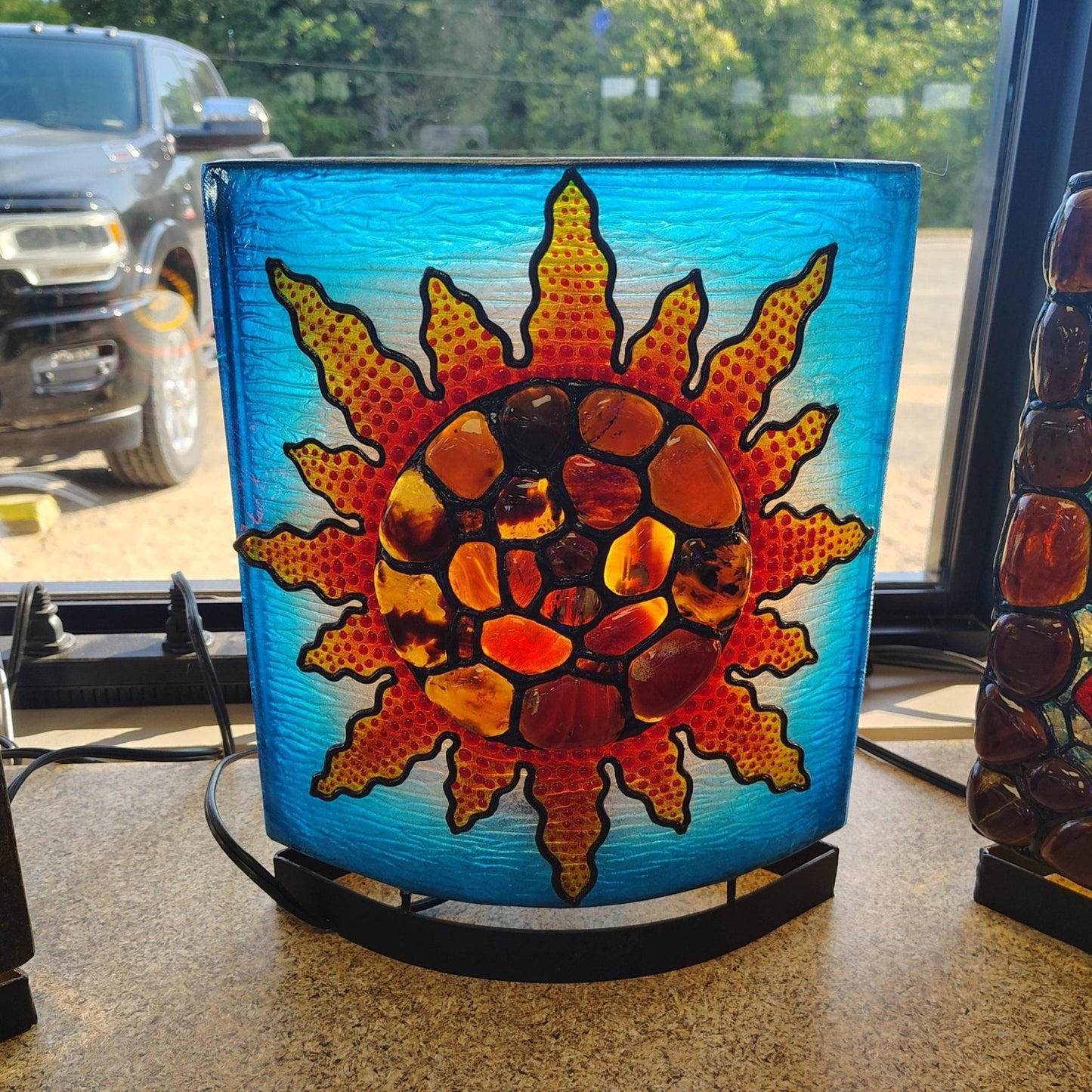 This is the backside of the Sumatra Amber sunflower and resin table lamp