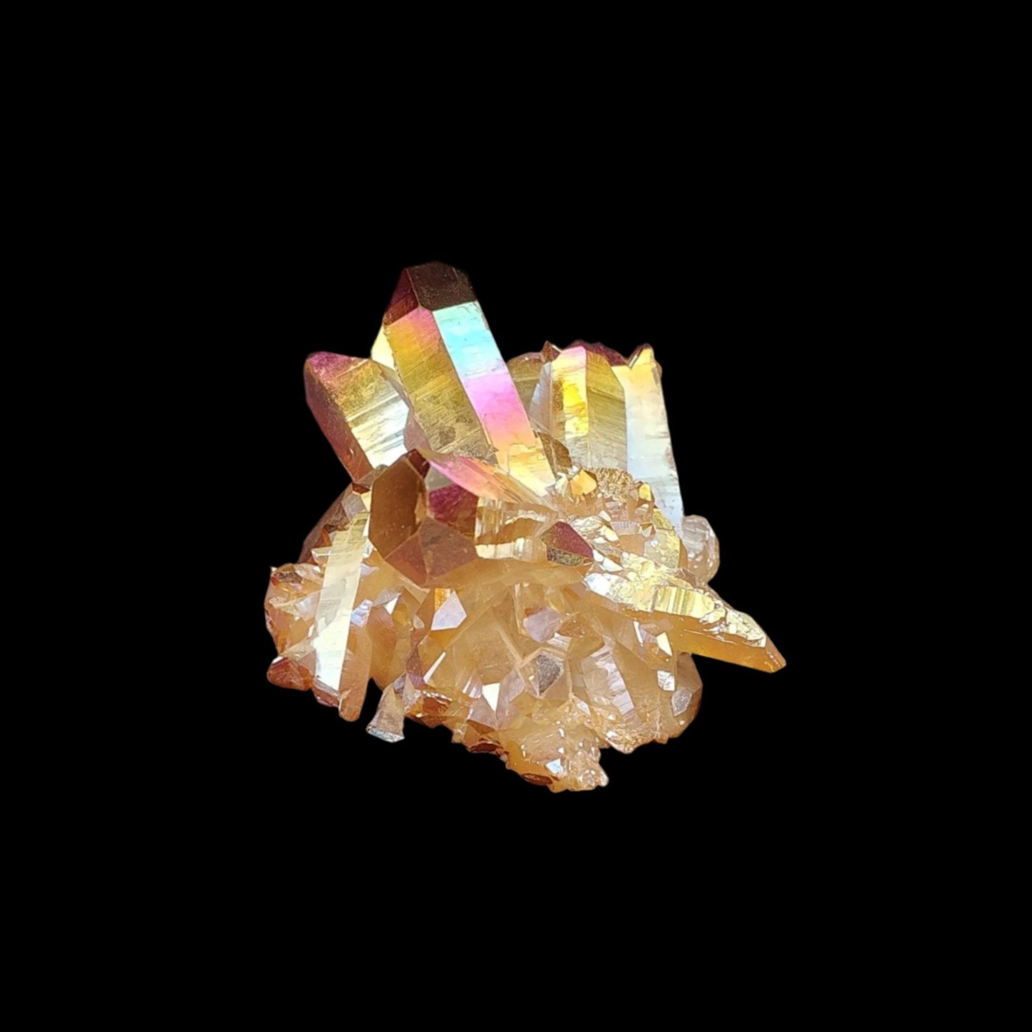 This is the right side of this sunset aura Quartz cluster