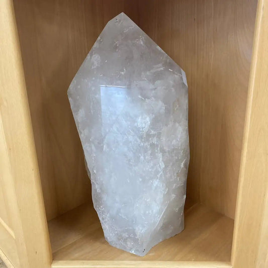 Large Crystal Point In A Wood Shelf