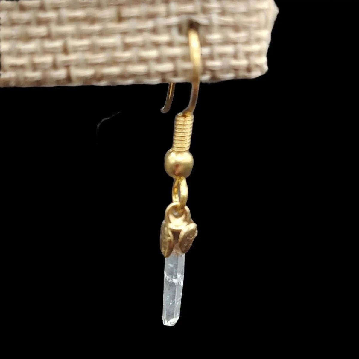 This is a close up of this gold-plated Tibetan quartz crystal point earring