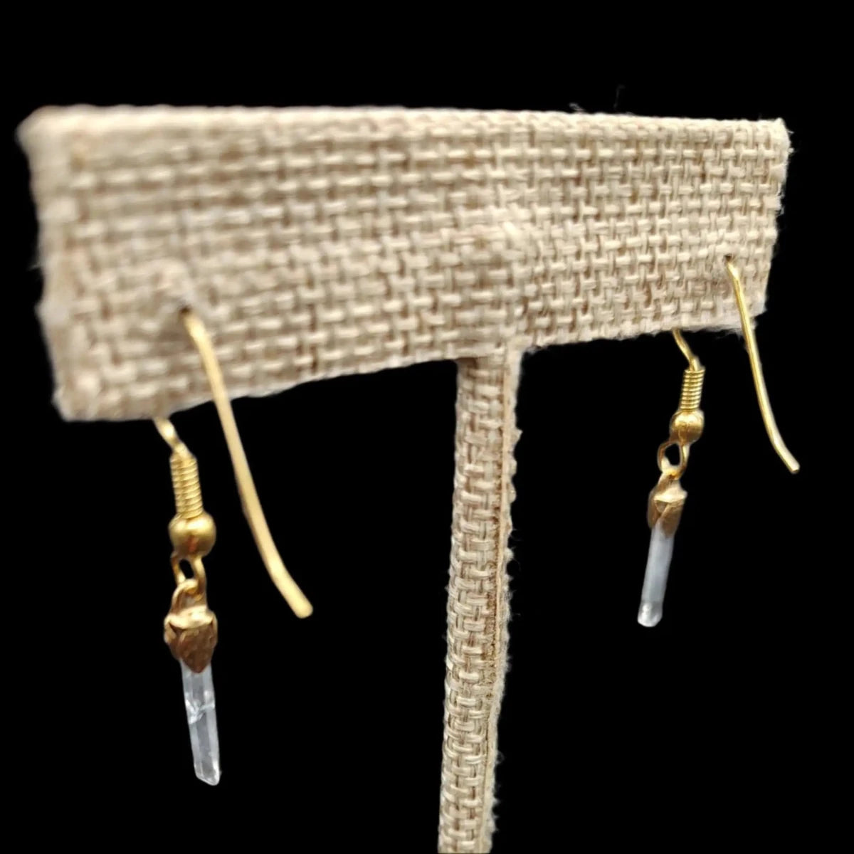 This is the back side view of these gold-plated Tibetan quartz crystal earrings