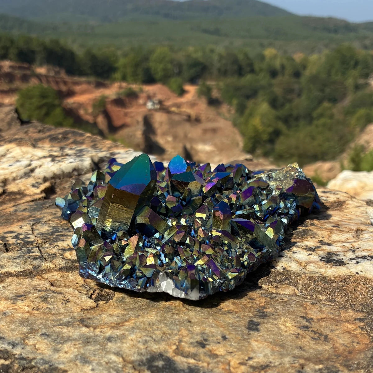 Left side of this quartz cluster, outdoors and on a boulder.