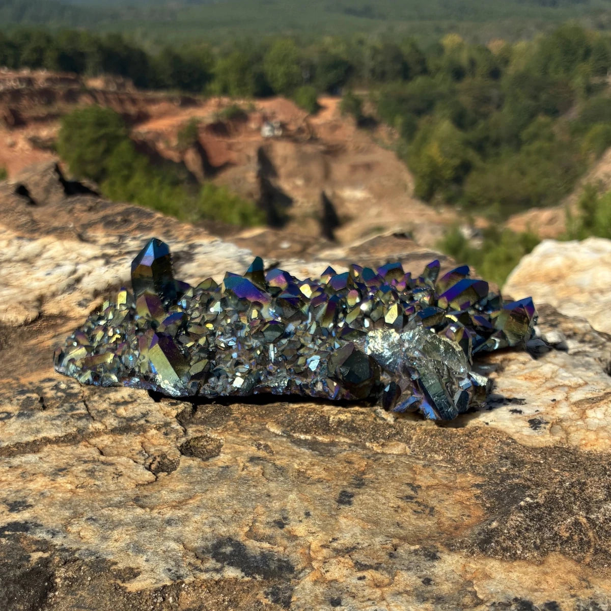 Back side of this quartz cluster, outdoors on a boulder.