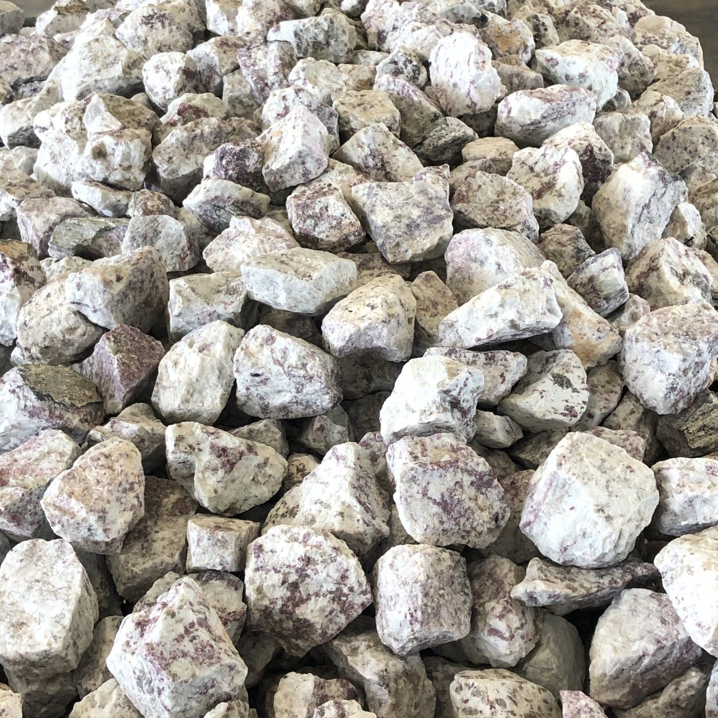 Table Filled With Rubellite With Calcite Rock Specimens