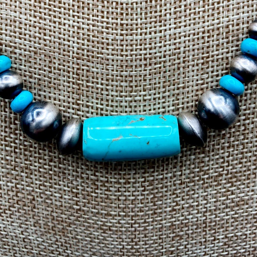 Close Up Of Turquoise And Silver Beads