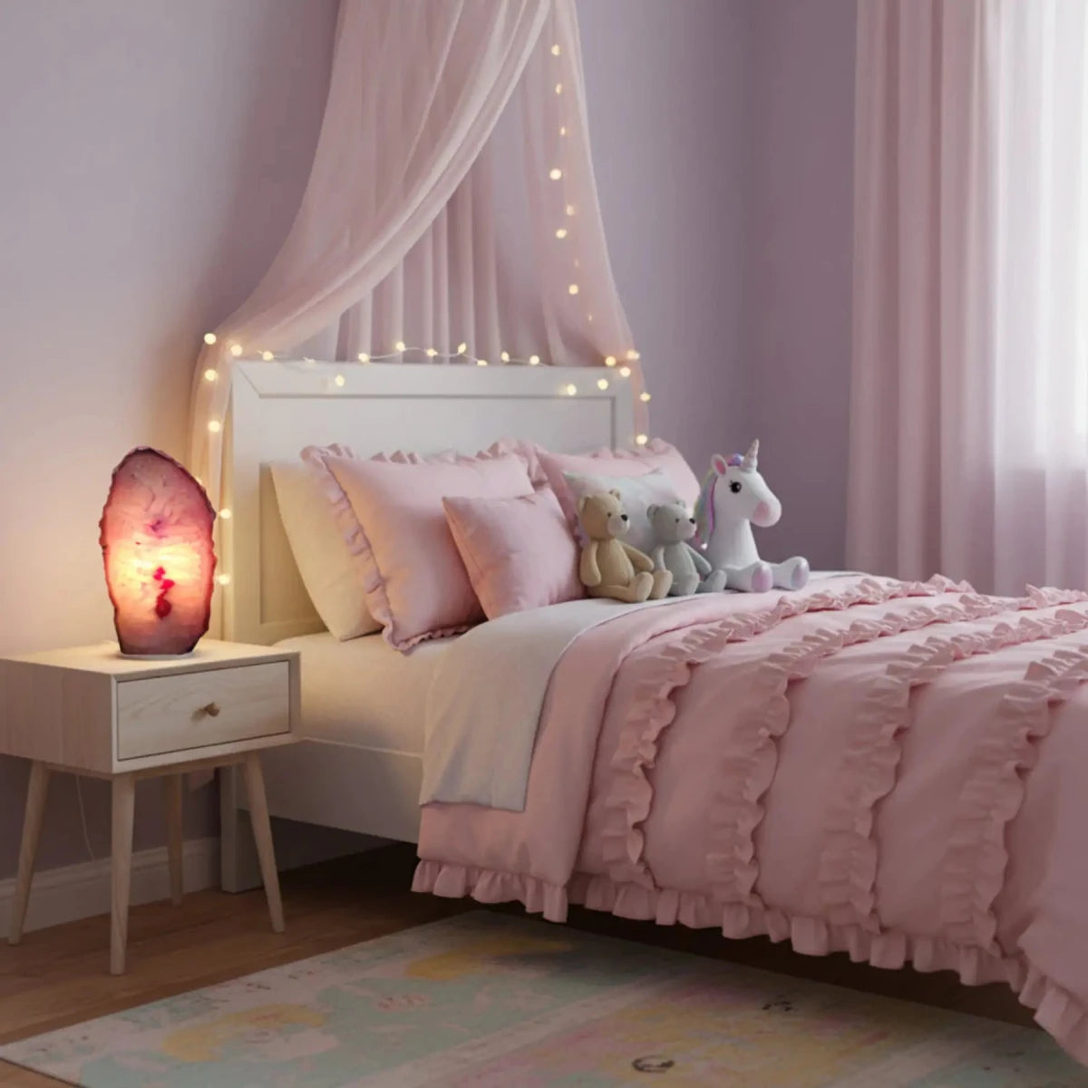 Unicorn Pink Agate Lamp Lighted in a girls bedroom.