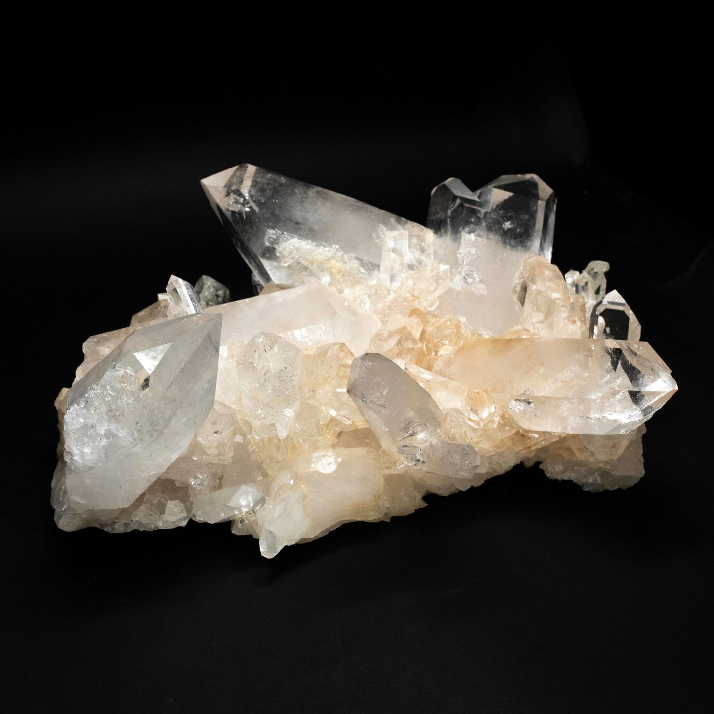 Side View Of A Large Clear Cluster Point Jutting From A Cluster