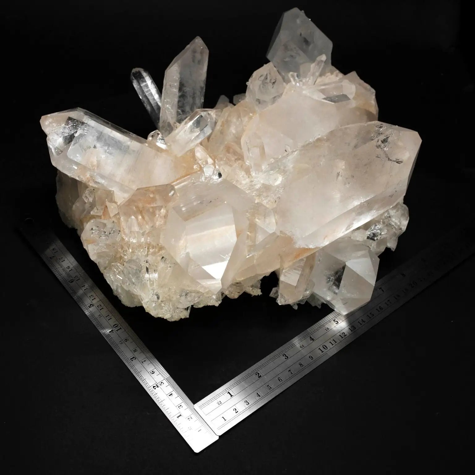 Two Metal Rulers Beside A Uniquely Formed Quartz Crystal Cluster