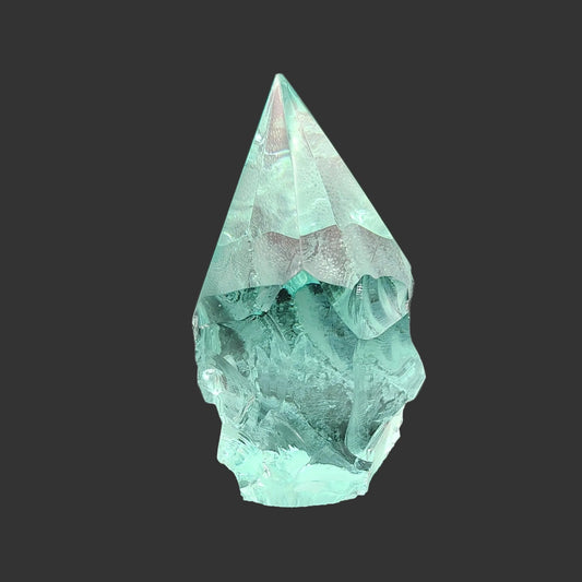 This is the front side of this authentic blue-green hand-carved Obsidian freeform. 