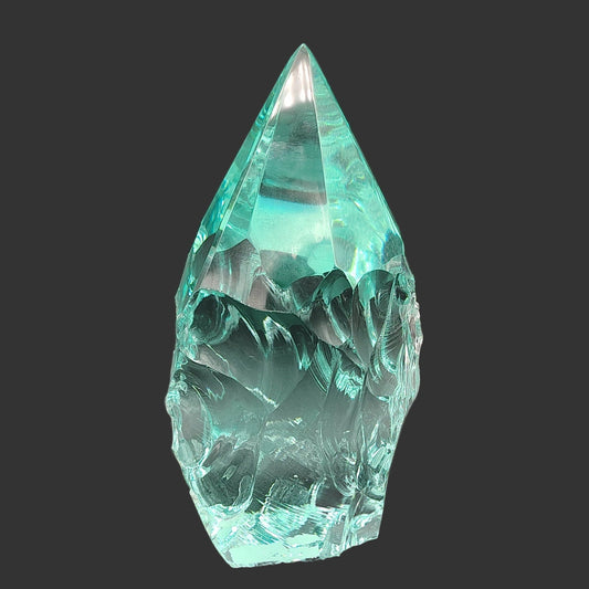 This is the front side of this blue-green volcanic glass