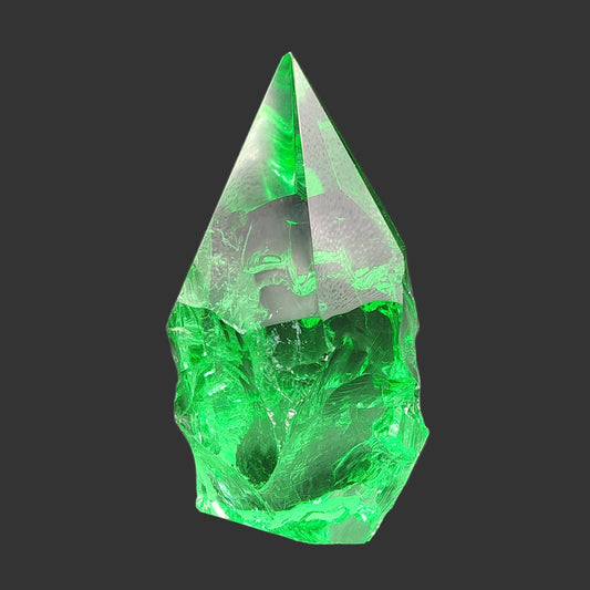 This is the front side of this green volcanic glass freeform.