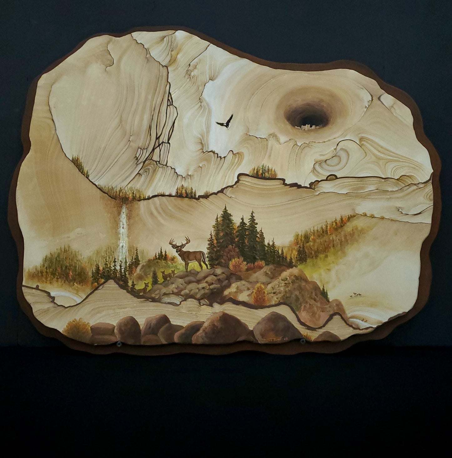 Buck, deer, waterfall, soaring eagle painting on sandstone