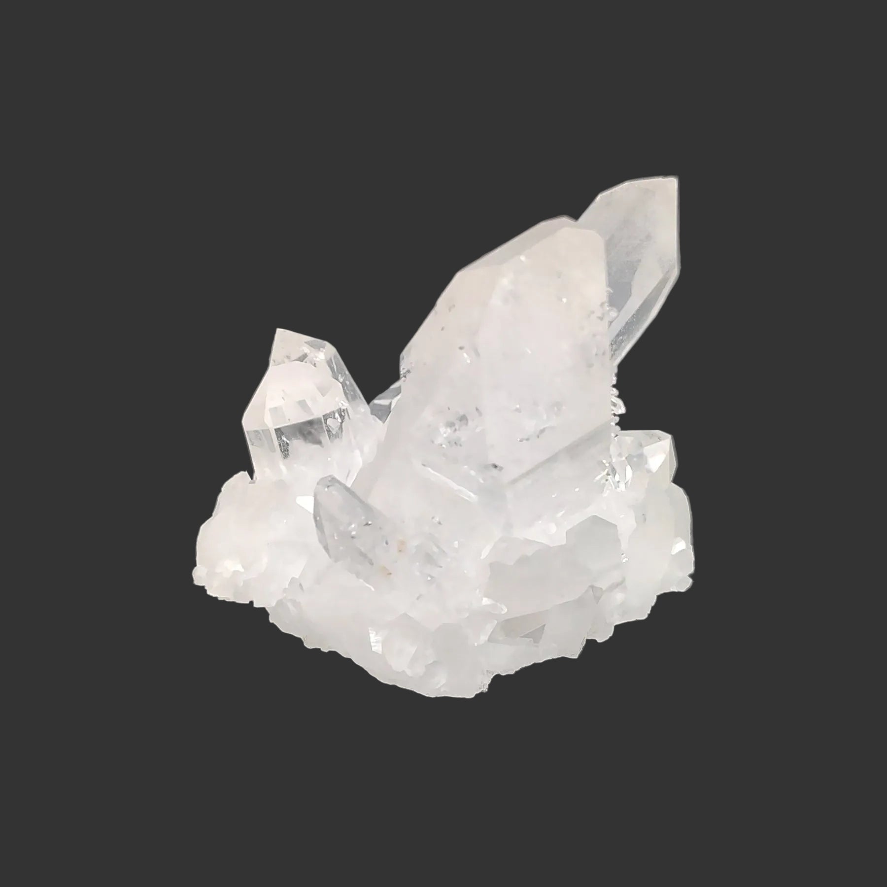 This is the left side of this Quartz crystal cluster, with a black background.