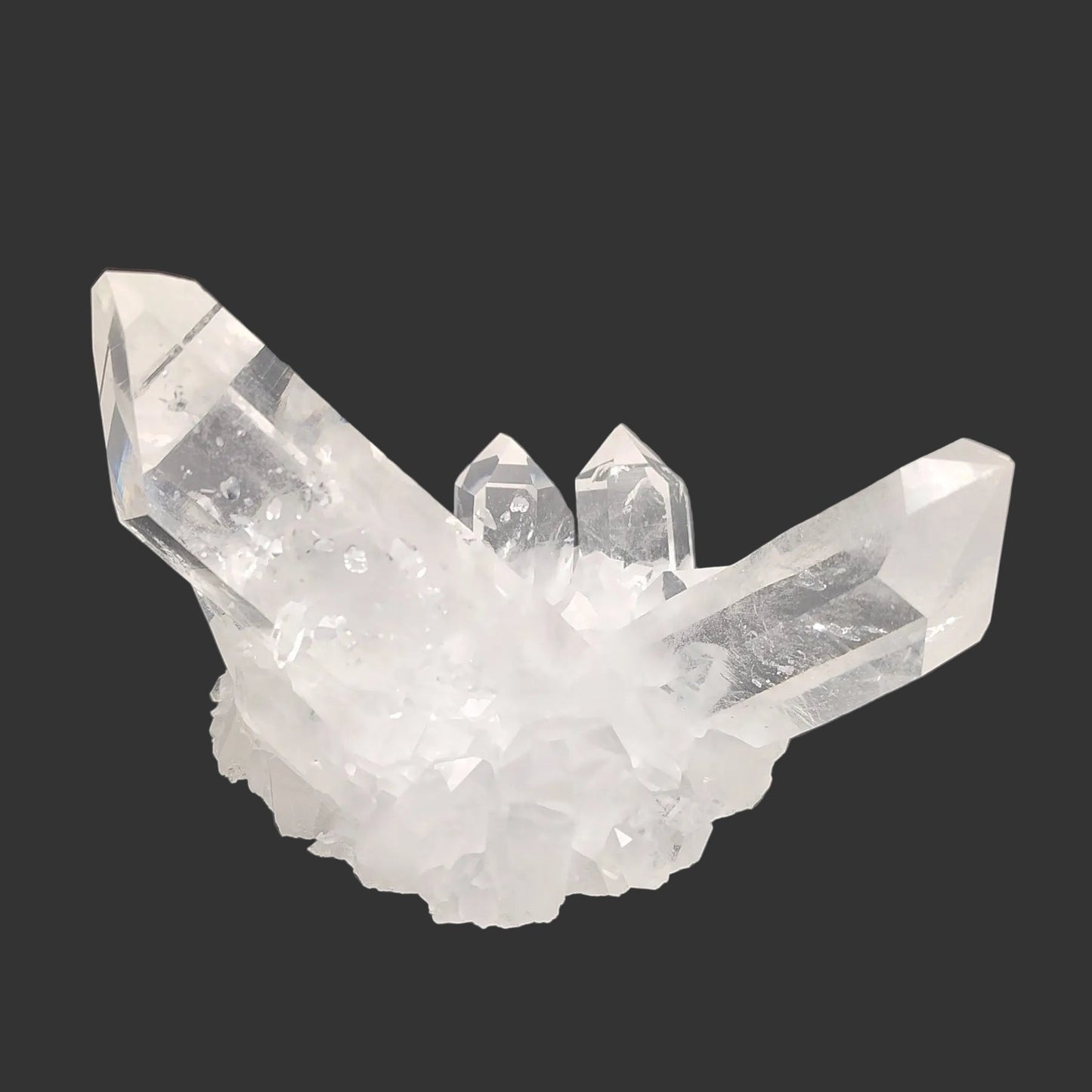 This is the back of this water clear Quartz crystal cluster.