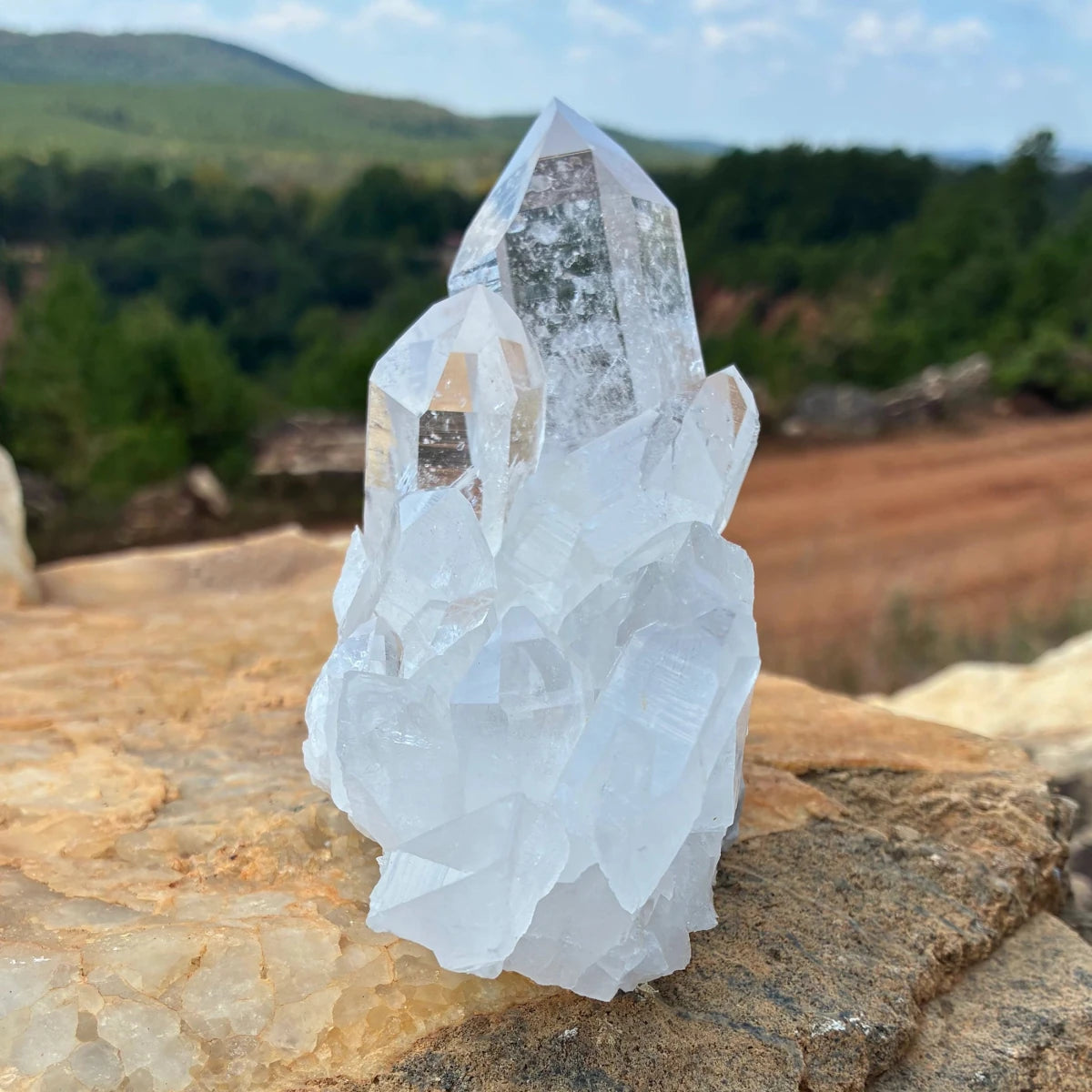 Left side of this quartz cluster, on a boulder outside.