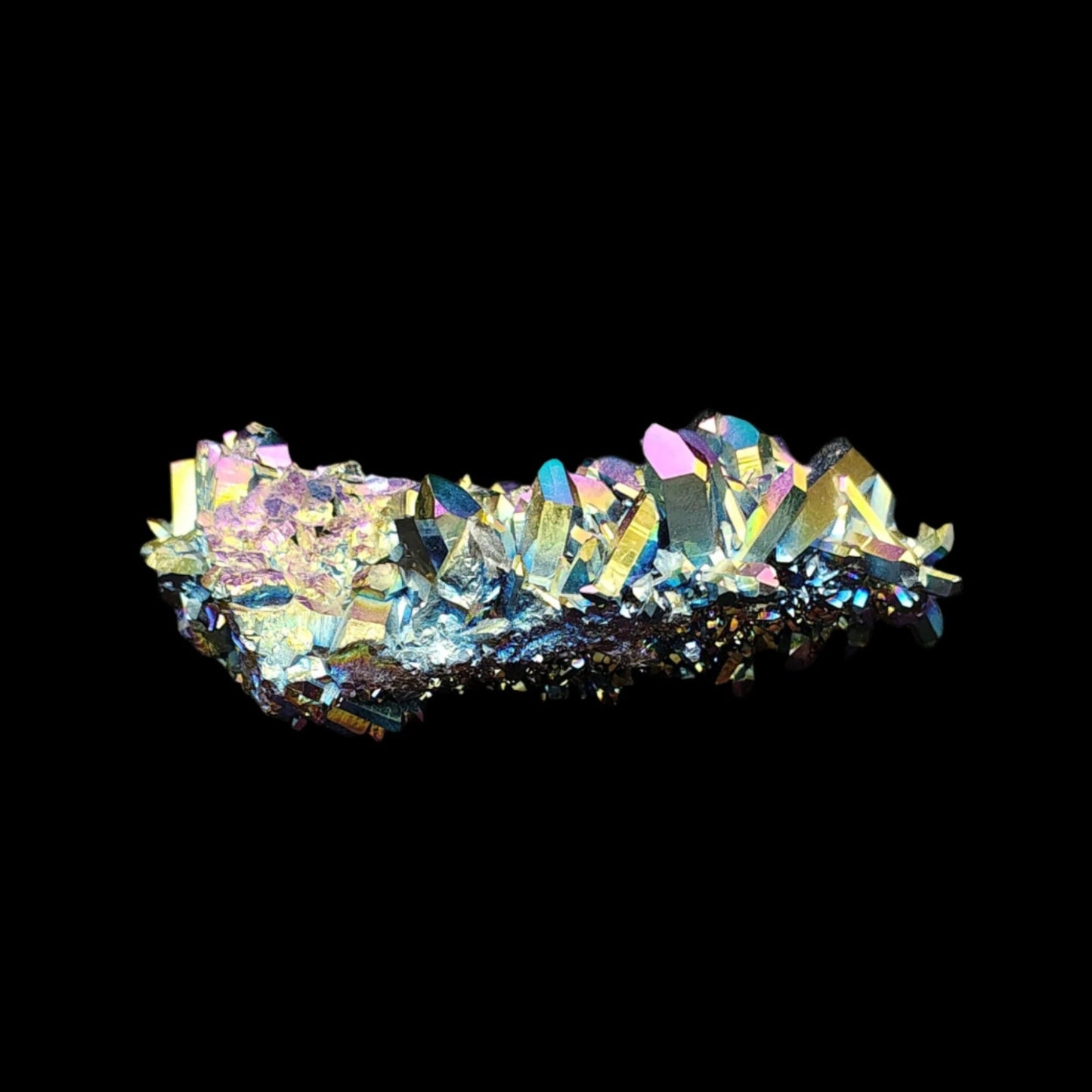 This is the back side of this rainbow aura quartz cluster