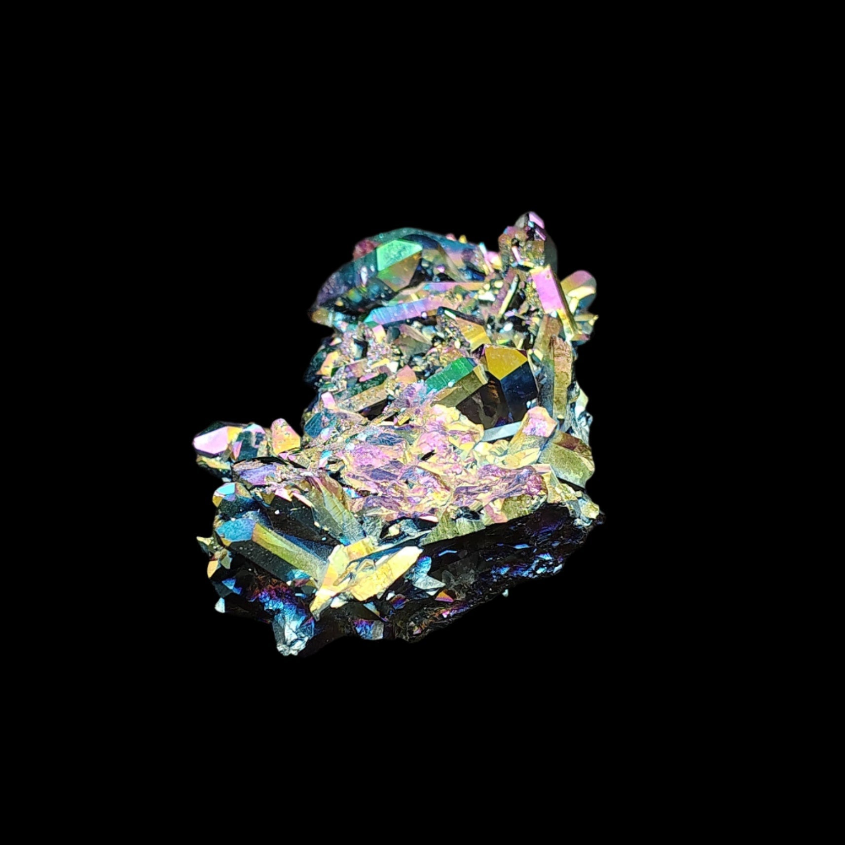 This is the left side of this rainbow aura quartz cluster