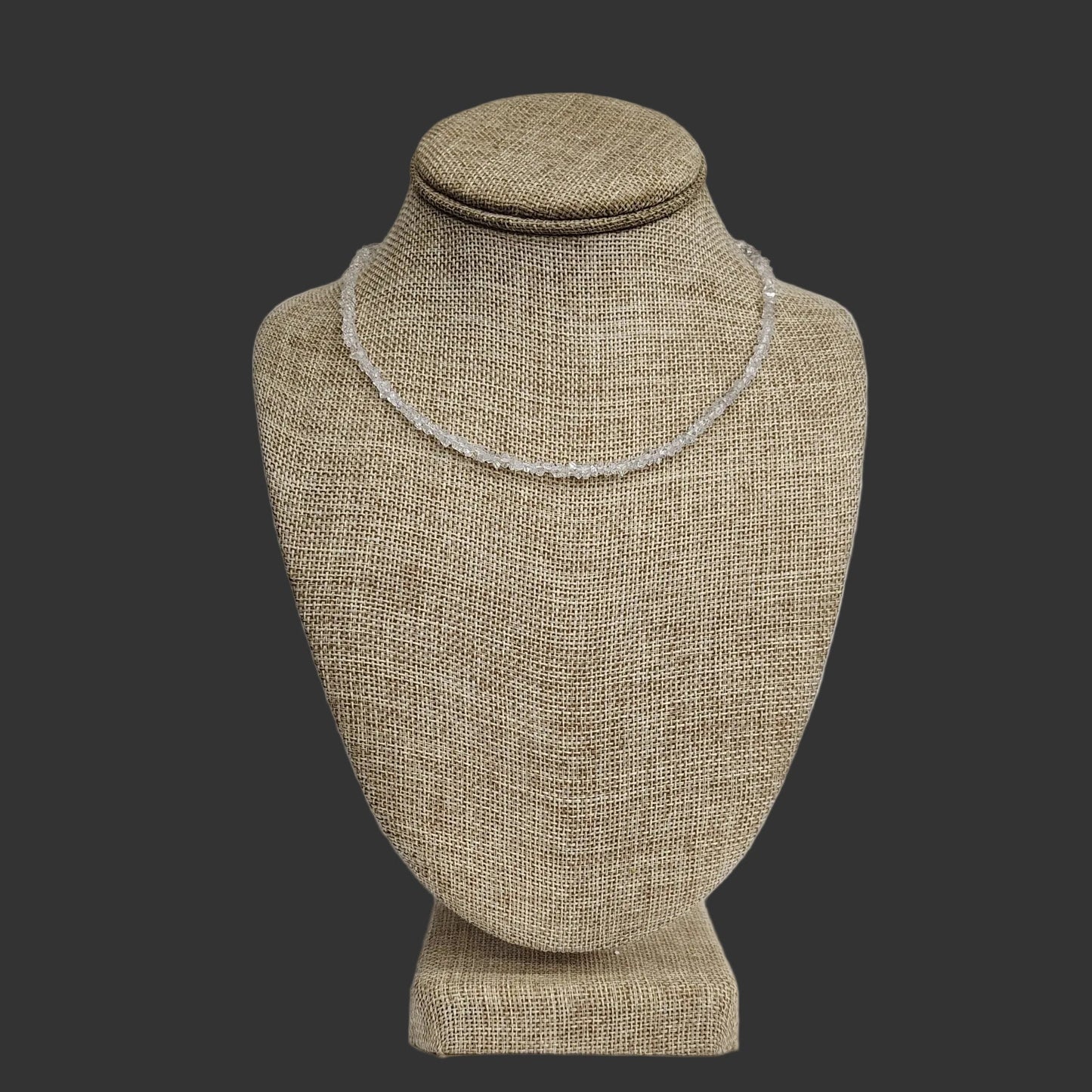 This necklace has sterling silver hardware and many extra small Herkimer's on it.