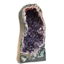 Load image into Gallery viewer, Amethyst Geode Cathedral Left side showing purple and clear crystal clusters
