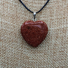 Load image into Gallery viewer, Close Up Of Heart Shaped Goldstone Pendent
