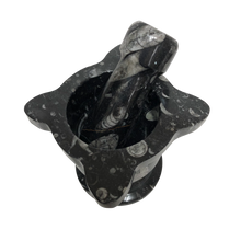 Load image into Gallery viewer, Top View Of Scalloped Area of Black Fossil Mortar And Pestle
