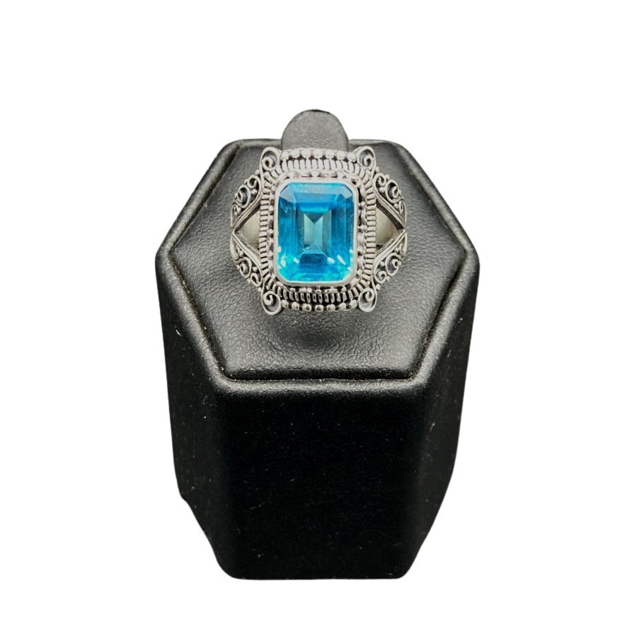 Face Of Sterling Silver Blue Topaz Ring