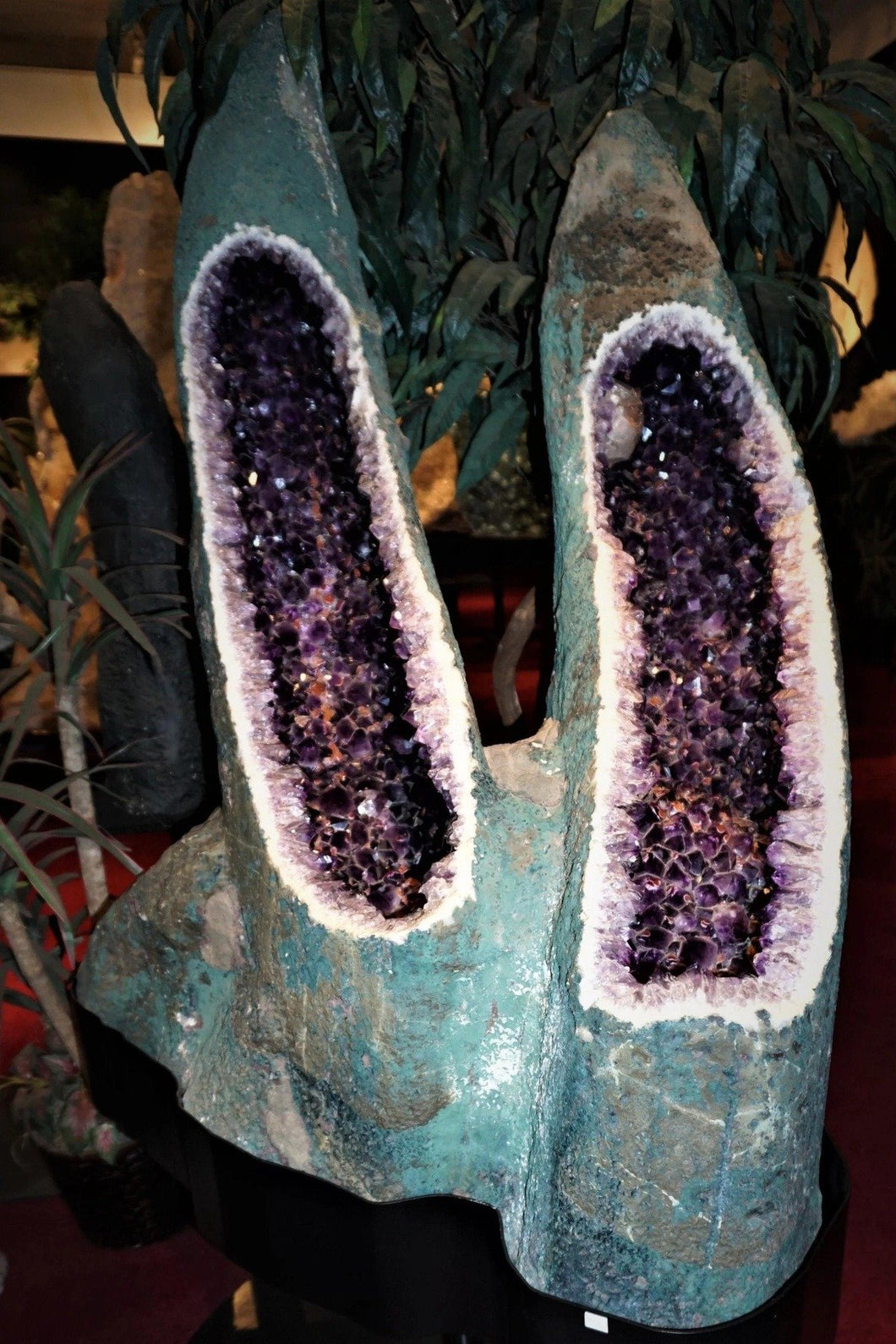 Twin Amethyst Cathedrals Purple Crystal Clusters WIth Green Gray Base Stone On Black Metal Stand