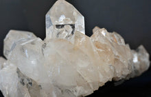 Load image into Gallery viewer, Close up of the largest point on a large quartz crystal cluster
