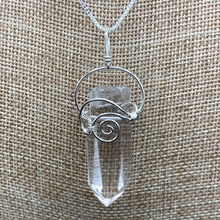 Load image into Gallery viewer, Pristine Wire Wrapped Crystal Point Necklace, Wire Is Sterling Silver Shaped Into A Curly Design, Crystal Is Water Clear
