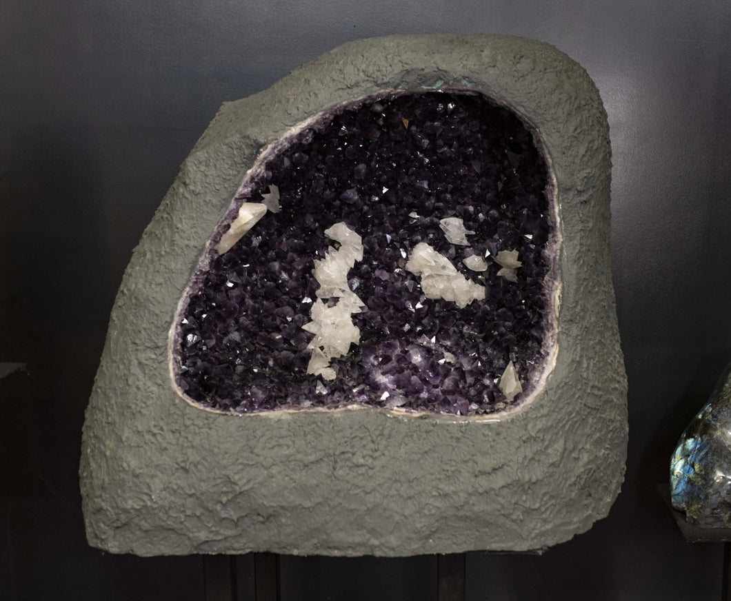 Amethyst Cave With Calcite Druzy Crystals Purple crystal clusters and white calcite within the geode