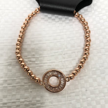 Load image into Gallery viewer, Rose Gold Tone Stretch Stacking Bracelet With Circle Design
