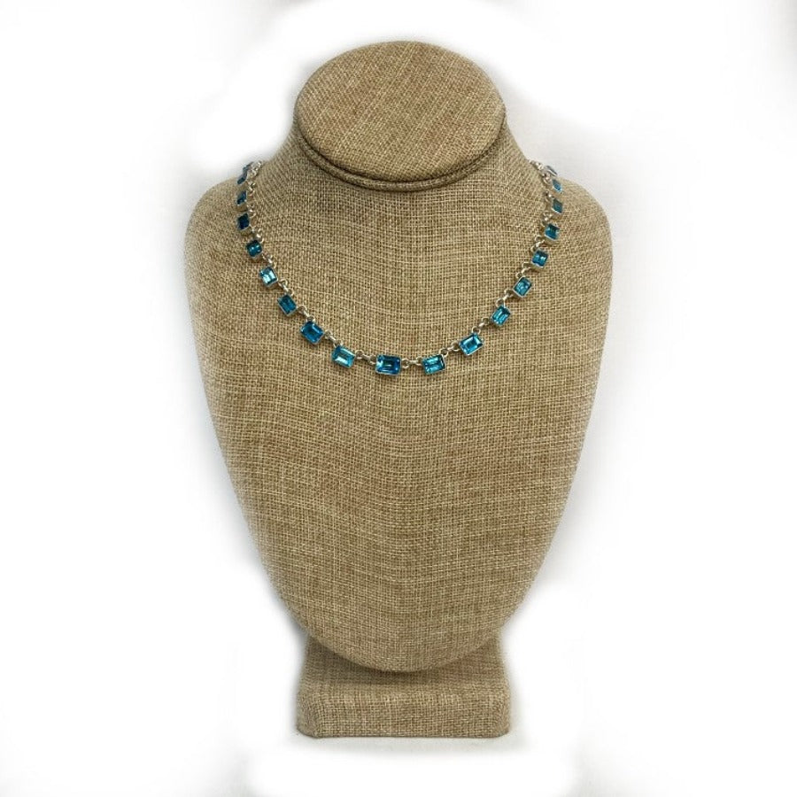 Sterling Silver And Blue Topaz Necklace